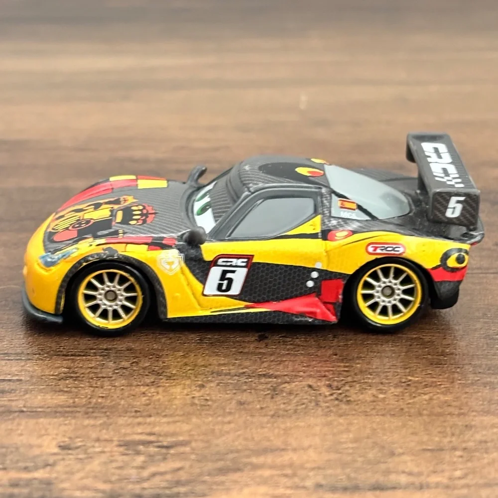 Disney Pixar Cars 2 Miguel Camino Diecast Gray Carbon Racers Toy Loose Mattel